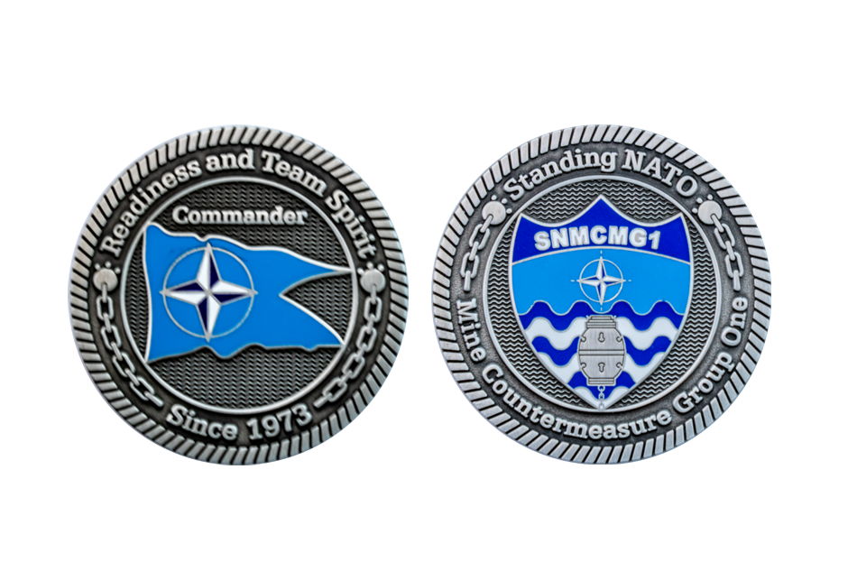 Custom Challenge Coins minted in Silver Antique with blue and white hard enamel colours and a special border design. Coins minted for NATO