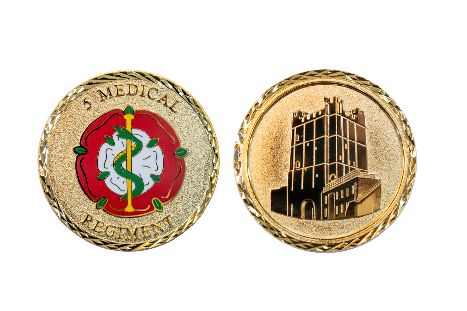 Custom Challenge Coins embossed for the 5th Medical Regiment. Golden, in polished and sandblasted finish, with enamel-coloured details