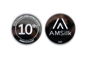 Custom-made Silver Coins in Polished Plate Finish. Company Logo embossed on Company Anniversary Coins