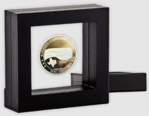 Exclusive coin packaging. Custom-minted golden coin in a floating frame