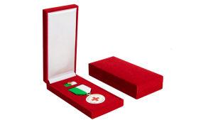 Red Velvet Coin Case with a military medal inside